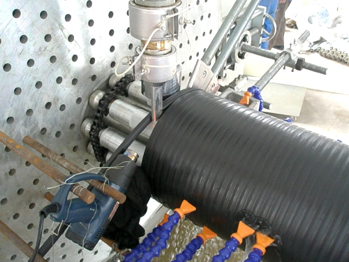 1467266816413466.jpg HDPE中空壁纏繞管設(shè)備.jpg